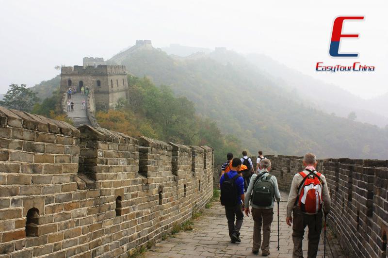 Senior travelers hiking on Great Wall